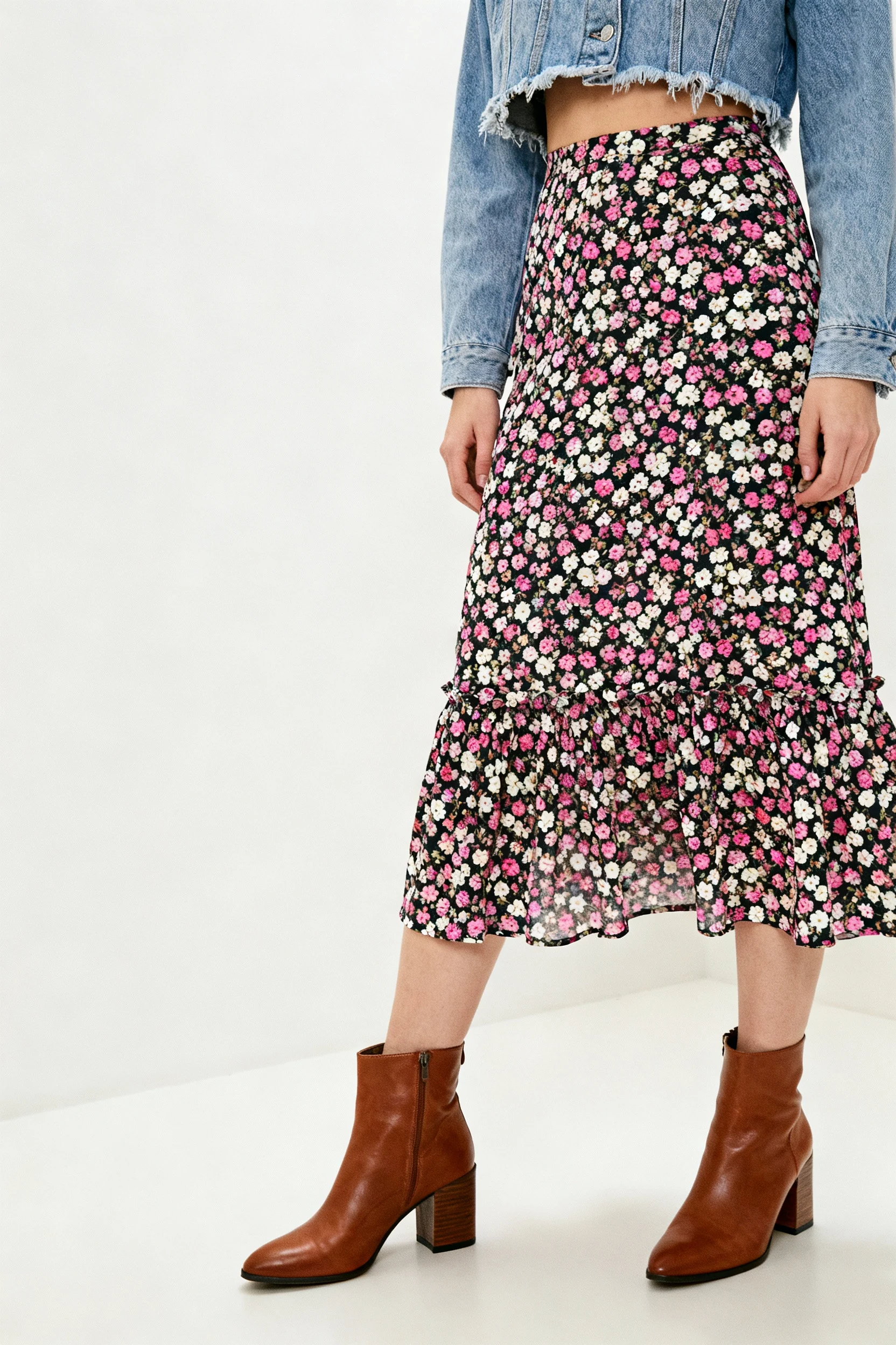 closeup female floral midi hem, cropped denim jacket, ankle boots